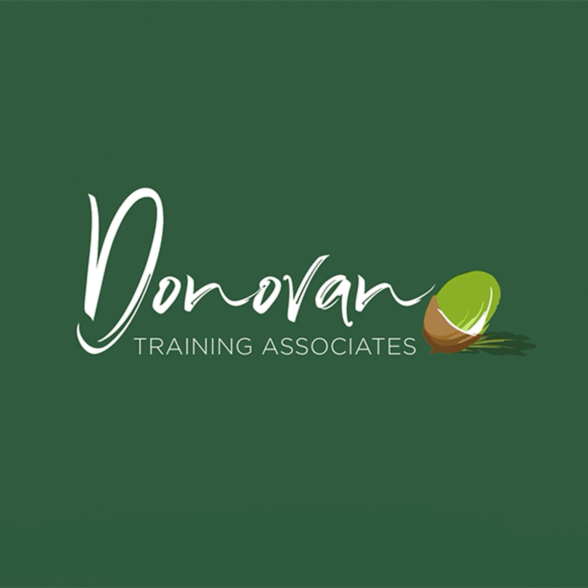 Typographic handwritten logo with a stylised acorn illustration on green